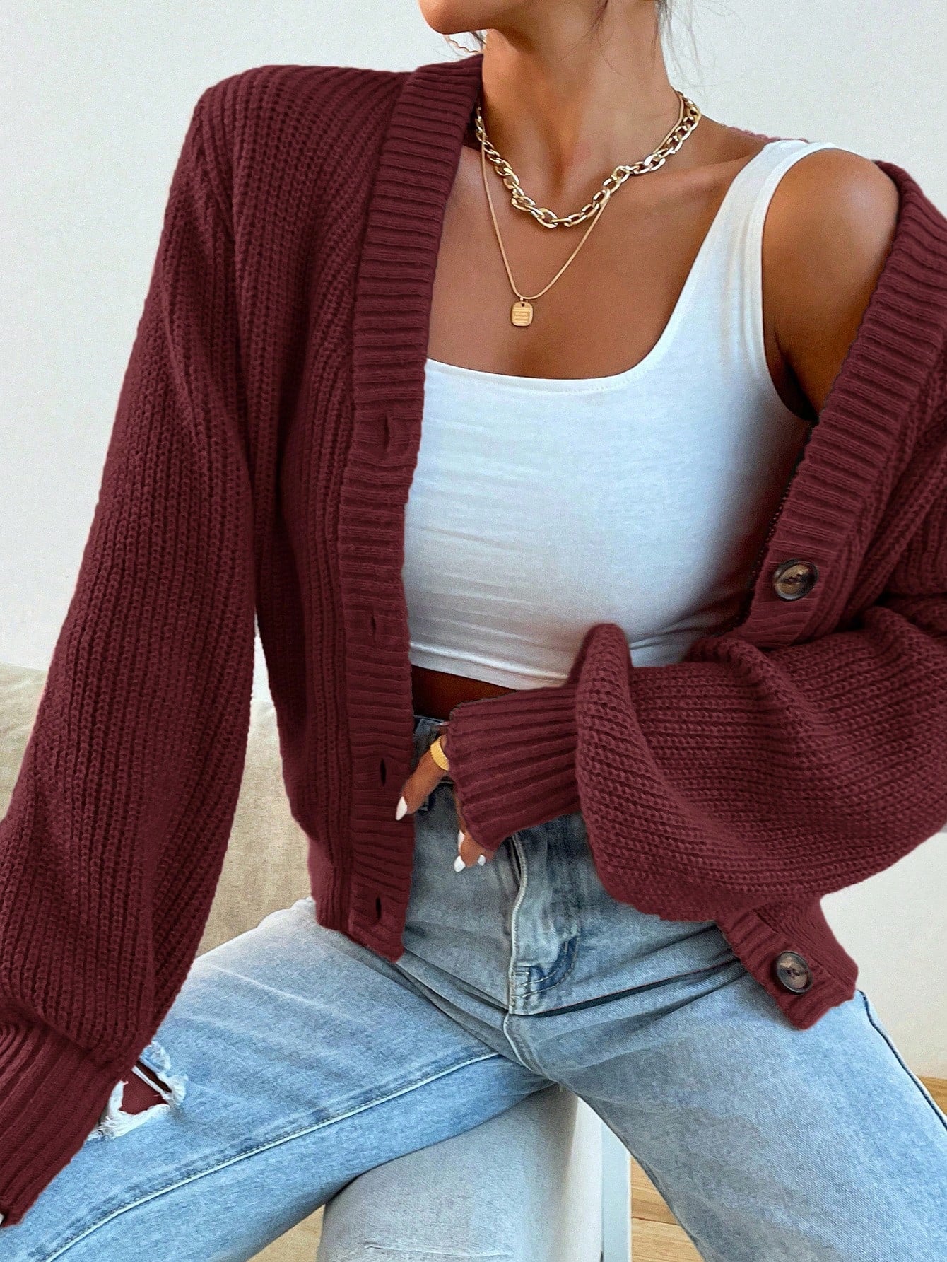 Stickad Kofta med Knappar